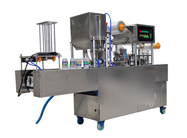 星火盒裝火鍋蘸醬灌裝封口機設(shè)備展示